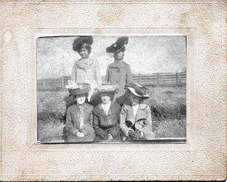 Inez Kilgore and Sylvia Knobel, standing in rear.  Ladies in front aren't identified.